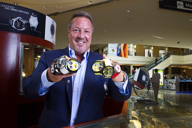 Stuart Berger, owner of Berger & Son Fine Jewelers, poses in the store at the Fashion Show Mall Monday Aug. 3, 2015.