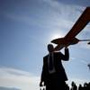 Dan Johnson of Sensurion Aerospace carries the Sensurion Aerospace Magpie commercial drone during an event Friday, Dec. 19, 2014, near Boulder City. The event was to announce the FAA's first issuance of an unmanned aerial systems test site special airworthiness certificate. 