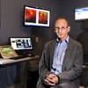 Edward Joseph Malik, O.D. of Eyes & Optics in his high-tech exam room.