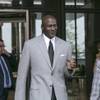 Michael Jordan leaves the U.S. courthouse Tuesday, Aug. 11, 2015, in Chicago after the first day of his civil trial against the defunct grocery-store chain Dominick's Finer Foods for using his name and jersey number without permission. 