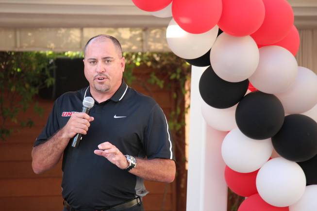 UNLV football coach Tony Sanchez talks to supporters during UNLV's Coaches Caravan on Wednesday, May 27, 2015, at the Green Valley Ranch Resort and Spa.