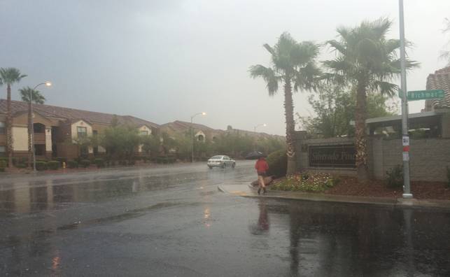 Heavy rain falls in the area of Silverado Ranch Boulevard and Bermuda Road on Thursday, Aug. 13, 2015.