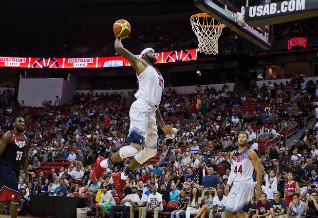 White Team player Demarcus Cousins, 36, soars to the hoop during the USA Basketball Las Vegas Showcase game at the Thomas & Mack Center on Thursday, August 13, 2015.