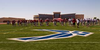 The UNLV football team holds a scrimmage at Nellis AFB on Saturday, August 15, 2015.