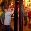 Phil Reed, center, director of operations, and Tim Lorenzen, right, director of security, close the doors on the Las Vegas Club early Thursday, Aug. 20, 2015, in downtown Las Vegas.