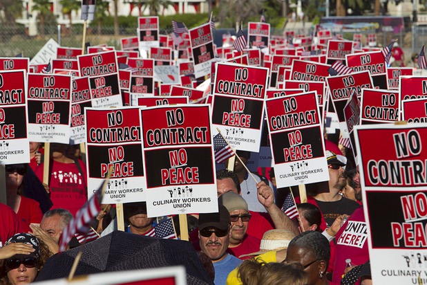 Members of the Culinary Workers Union, Local 226, and supporters march toward the Trump International Hotel Las Vegas during a protest Friday Aug. 21, 2015. The Trump International Hotel workers are not unionized. STEVE MARCUS