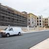 Slow-moving construction continues on an expansion project Tuesday, Aug. 25, 2015, at the retail and dining complex Tivoli Village.