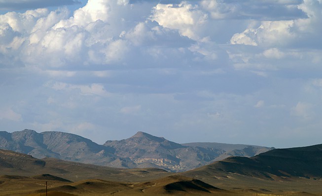 A view of Yucca Mountain, center, as seen from Amagosa ...