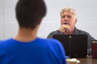 Psychiatrist Norton Roitman interviews a teen during a clinic at the Caliente Youth Center in Caliente, Nev., about 150 miles north of Las Vegas,Tuesday, Sept. 8, 2015.