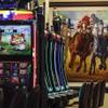 This March 5, 2015, photo shows video gaming terminals at Les Bois Park in Garden City, Idaho. Idaho's highest court says the state must enforce legislation banning lucrative instant horse racing terminals after ruling that Gov. C.L. "Butch" Otter's veto of the bill was invalid.