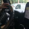 An Uber driver takes a passenger for a ride Tuesday, Sept. 15, 2015, in Las Vegas.
