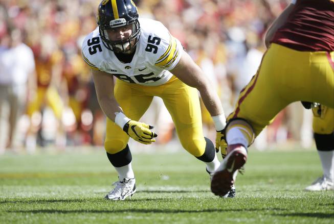 Iowa defensive lineman Drew Ott (95) gets set at the line during the first half of an NCAA college football game against Iowa State, Saturday, Sept. 12, 2015, in Ames, Iowa.