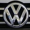 In this photo taken Feb. 14, 2013, a Volkswagen logo is seen on the grill of a Volkswagen on display in Pittsburgh.