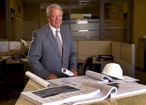 Sam Nicholson, owner and president of Grand Canyon Development Partners, poses at the company Monday, Sept. 21, 2015. 