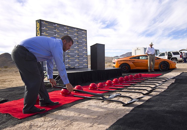 Andrew Fessler lays out shovels during a ground breaking ceremony for Speed Vegas, a $30 million, 90-acre racetrack project on Las Vegas Boulevard south of the M Resort, Monday, Sept. 21, 2015. The project is expected to open in early 2016.