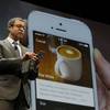In this March 18, 2015, file photo, Adam Brotman, Starbucks chief digital officer, talks about the company's new mobile ordering app at Starbucks Coffee Company's annual shareholders meeting in Seattle. The Seattle-based coffee chain says its mobile app that lets people order and pay in advance will be available nationally starting Tuesday, Sept. 22, 2015.