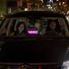 A Lyft car ferries passengers. 