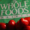 In this Monday, July 29, 2013, file photo, produce is placed on a Whole Foods paper bag in Andover, Mass.