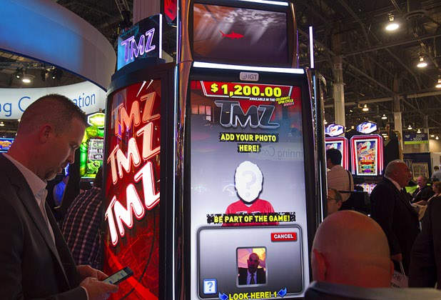 A TMZ-themed slot machine allows the player to put himself into a bonus round during the Global Gaming Expo (G2E) at the Sands Expo Center Tuesday, Sept. 29, 2015.