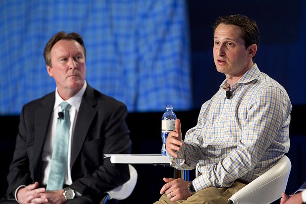 Jason Robins, CEO of DraftKings, speaks during a fantasy sports and sports betting panel Tuesday, Sept. 29, 2015, at the Global Gaming Expo. Moderator Tom Roche of Ernst & Young listens at left.