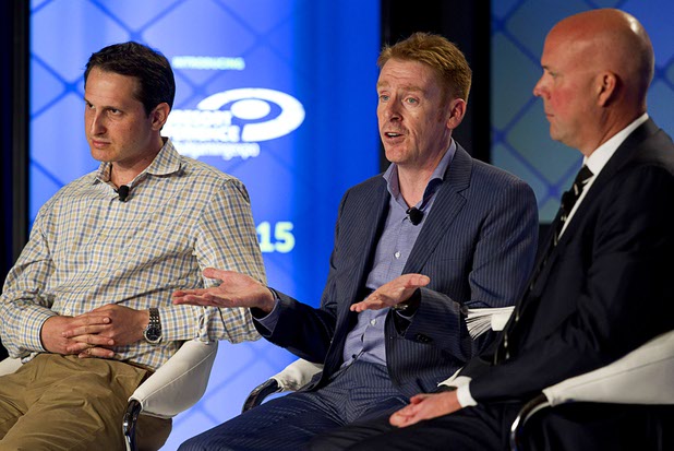 Jason Robins, left, CEO of DraftKings, Chris Sheffield, center, of Penn National Gaming, and Jeff Burge of CG Technology take part in a fantasy sports and sports betting panel at the Global Gaming Expo (G2E) Tuesday, Sept. 29, 2015.