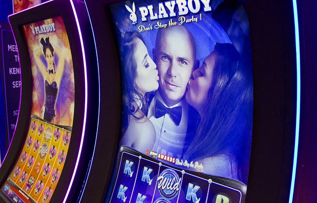 A Playboy slot machine featuring Pitbull is displayed during the second day of the Global Gaming Expo (G2E) in the Sands Expo Center Wednesday, Sept. 30, 2015.