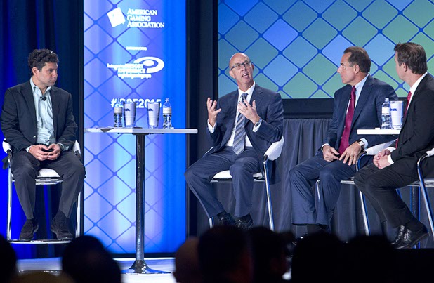 From left: Greg Carlin, CEO of Rush Street Gaming, Gavin Isaacs, CEO of Scientific Games, and Mark Frissora, CEO/president of Caesars Entertainment, take part in CEO round table during the Global Gaming Expo (G2E) in the Sands Expo Center Wednesday, Sept. 30, 2015.  Bo Bernhard, far right, executive director of the International Gaming Institute at UNLV, moderated the forum.