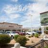 The Jim Marsh Kia Mitsubishi dealership on West Centennial Parkway is shown Tuesday, Sept. 29, 2015. It is among many in the valley that have enjoyed increased sales amid cheap borrowing costs and easier financing.