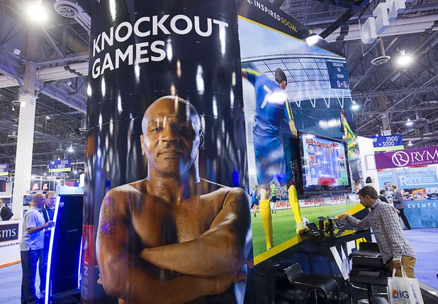 A view of the Inspired booth during the Global Gaming Expo (G2E) in the Sands Expo Center Thursday Oct. 1, 2015. Mike Tyson is featured in the company's Rush Boxing game.
