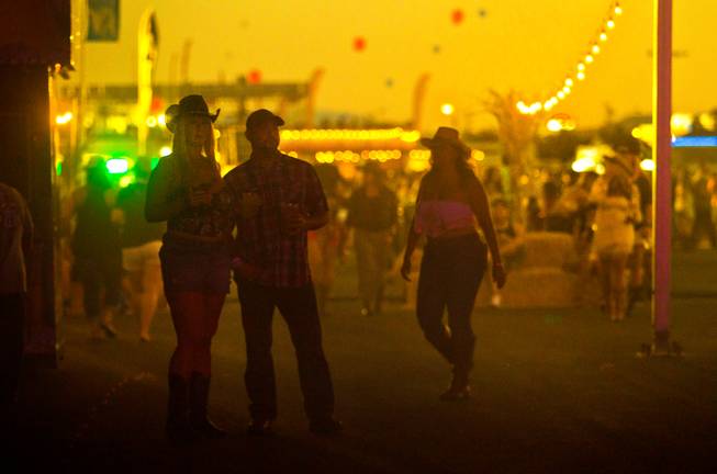 Dusk settles in during the Route 91 Harvest Country Music Fest on Saturday, Oct. 3, 2015, at Las Vegas Village.