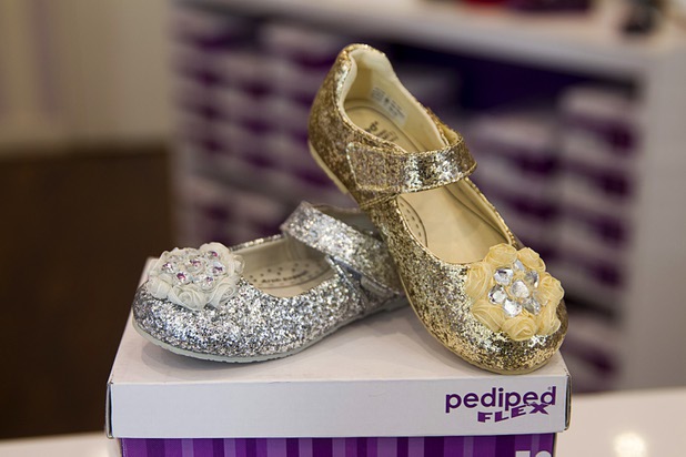 Shoes are displayed in the Pediped store at Town Square Tuesday, Oct. 6, 2015.