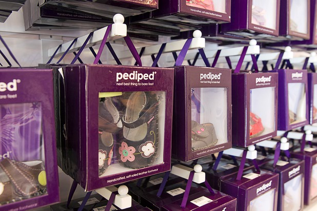 Shoes are displayed in the Pediped store at Town Square Tuesday, Oct. 6, 2015.