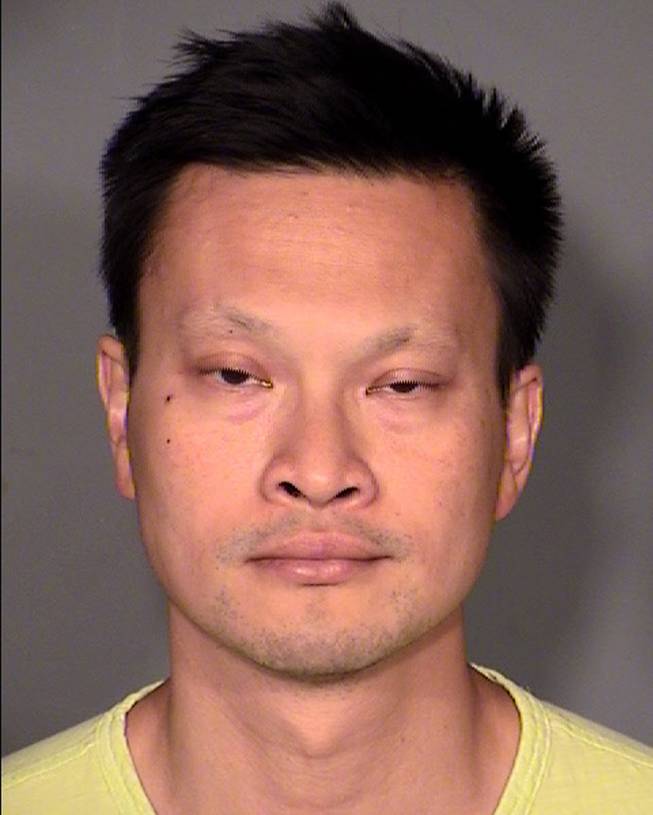 This Clark County Detention Center booking photo of June 20, 2015, shows Dr. Binh Minh “Ben” Chung, 41.