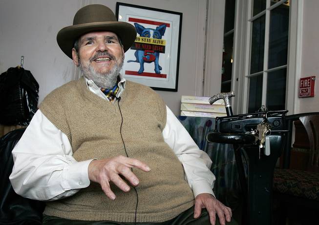 In this Friday, Feb. 2, 2007, file photo, chef Paul Prudhomme gestures during an interview at his French Quarter restaurant, K-Paul's Louisiana Kitchen, in New Orleans.