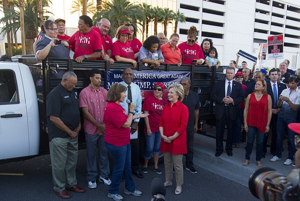 Democratic presidential candidate and former Secretary of State Hillary Clinton, right, listens to Geoconda Arguello Kline, secretary-treasurer for Culinary Workers Union, Local 226, during a Culinary demonstration by the Trump International Hotel Monday, Oct. 12, 2015.