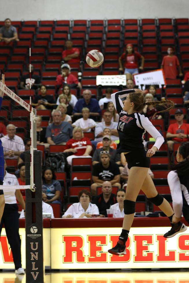 UNLV sophomore Ashley Owens elevates for a ball in a recent match.