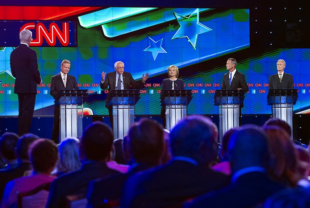 CNN's Anderson Cooper, far left, moderates Democratic presidential candidates during the CNN Democratic Presidential Debate at the Wynn Las Vegas Tuesday, Oct. 13, 2015. Candidates from left, are: Jim Webb, Bernie Sanders, Hillary Clinton, Martin O'Malley, and Lincoln Chafee.