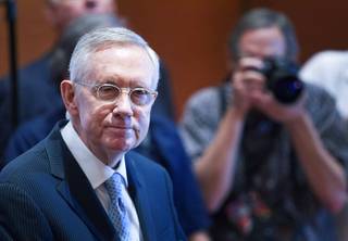 Senate Majority Leader Harry Reid (D-Nev)listens to a question during a news conference ahead of the CNN Democratic Presidential Debate at the Wynn Las Vegas Tuesday, Oct. 13, 2015.