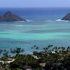 This Dec. 26, 2011, photo shows the Mokulua Islands from a view on the Lanikai Pillboxes trail in Lanikai, Hawaii.  
