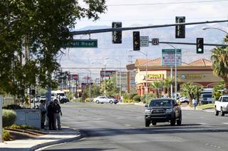 Metro Police investigate an auto-pedestrian accident at the intersection of Spring Mountain and Lindell roads, Oct. 22, 2015. The intersection was closed in both directions during the investigation. The pedestrian was taken to University Medical Center in critical condition, police said.