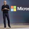 In this Oct. 6, 2015, photo, Microsoft CEO Satya Nadella closes a presentation of new devices in New York. Microsoft reports quarterly financial results Thursday, Oct. 22, 2015. 