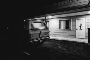 A parked car outside room 105 at the Clown Motel in Tonopah, Nev. on October 18, 2015.