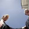 Donald Trump, left, talks with then-Las Vegas Mayor Oscar Goodman during a topping-off ceremony for the first tower of the Trump International Hotel & Towers on May 25, 2007.