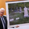 Lawyer for Glenwood Cemetery Association Paul Belnap holds a photo showing the headstone that killed a 4-year-old boy during court, Tuesday, Oct. 27, 2015, in Park City, Utah. 
