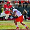 UNLV's Kendal Keys, 84, takes a big hit from Boise State's Darian Thompson, 4, on a long pass play during their game at Sam Boyd Stadium on Saturday, October 31,  2015. .