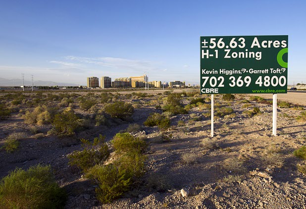A view of vacant land is shown south of the South Point and a time-share complex in Henderson Monday, Nov. 2, 2015. About 56 acres of the land is being offered for sale by Station Casinos. 