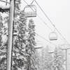 Snow falls on lifts at the Kirkwood ski resort Monday, Nov. 2, 2015, in Kirkwood, Calif. The first winter-like storm of the season brought rain and snow to California on Monday, triggering traffic accidents including a several vehicle crash in the southern San Joaquin Valley. 