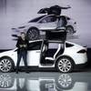 Elon Musk, CEO of Tesla Motors, introduces the Model X car at the company's headquarters Tuesday, Sept. 29, 2015, in Fremont, Calif. 