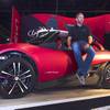 Local Motors CEO John B. Rogers Jr. sits on the LM3D Swim, the world’s first road-ready, 3D-printed car, during SEMA on Wednesday, Nov. 4, 2015, at the Las Vegas Convention Center.
