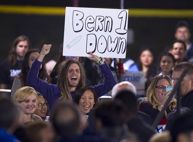 A supporter cheers Democratic presidential candidate Bernie Sanders during a rally at the Cheyenne Sports Complex, in North Las Vegas Sunday, Nov. 8, 2015.